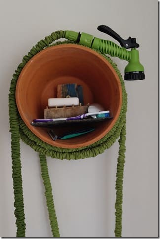 Enrouleur tuyau arrosage fait maison